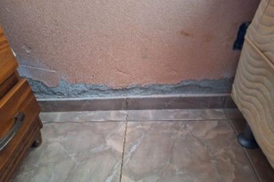 Fotos: Perícia MPF Foto mostra infiltração na parede da casa do condomínio