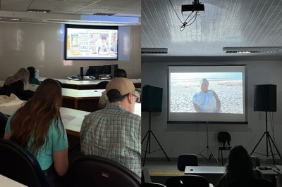 Exibição do documentário "Marambaia: do quilombo à justiça" na FGV (esq.) e na UFS (dir.). A imagem anexa é uma colagem lado a lado mostrando dois momentos distintos de projeção em sala de aula, provavelmente durante algum evento, aula ou seminário. Na imagem da esquerda, uma pequena plateia de estudantes (ou participantes), incluindo uma pessoa em primeiro plano com boné e camisa xadrez, assiste a um vídeo projetado numa tela menor, que parece mostrar uma pessoa em um ambiente com estantes de livros. A imagem da direita mostra uma projeção maior, numa tela suspensa com projetor no teto, onde é exibida a foto ou cena de uma pessoa sentada na areia de uma praia ou área costeira. Em ambas as cenas, a iluminação da sala é reduzida para facilitar a visualização da projeção, e a disposição sugere um ambiente universitário ou de treinamento.