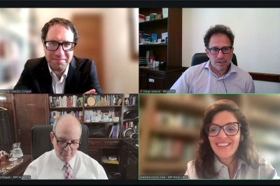 Imagem: print da transmissão do evento print da transmissão do evento com a imagem dos quatro palestrantes