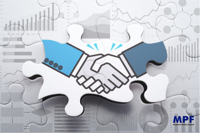 imagem de um quebra cabeça com duas mãos estilizadas em um cumprimento típico de celebração de um acordo 